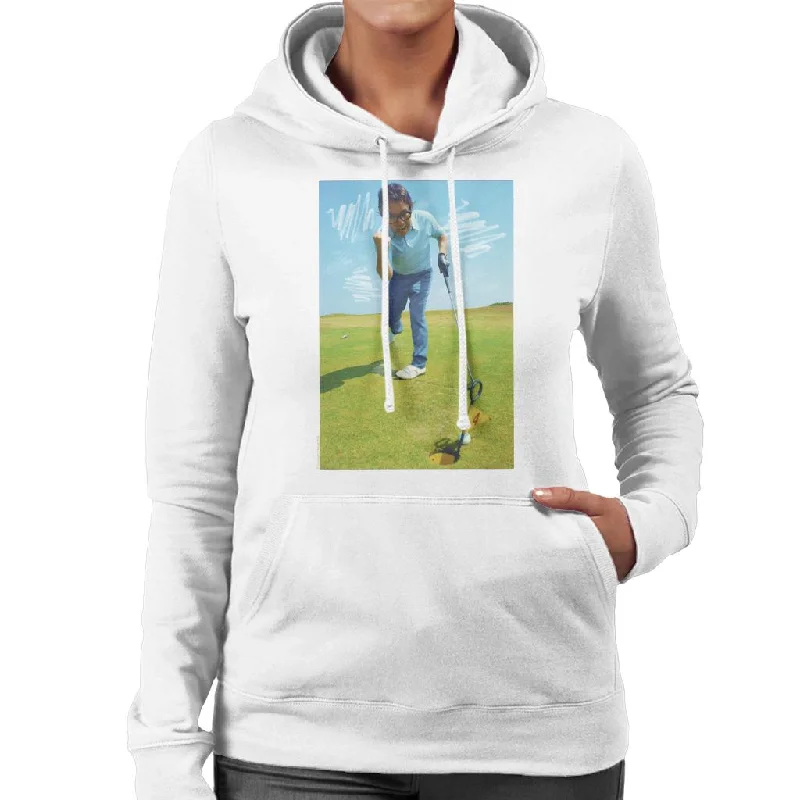 Steals and Deals comfy hoodieTV Times Ronnie Corbett Playing Golf 1971 Women's Hooded Sweatshirt